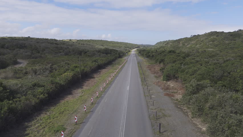 Garden Rout South Africa, Drone flying over lonely road in between the greenery 
