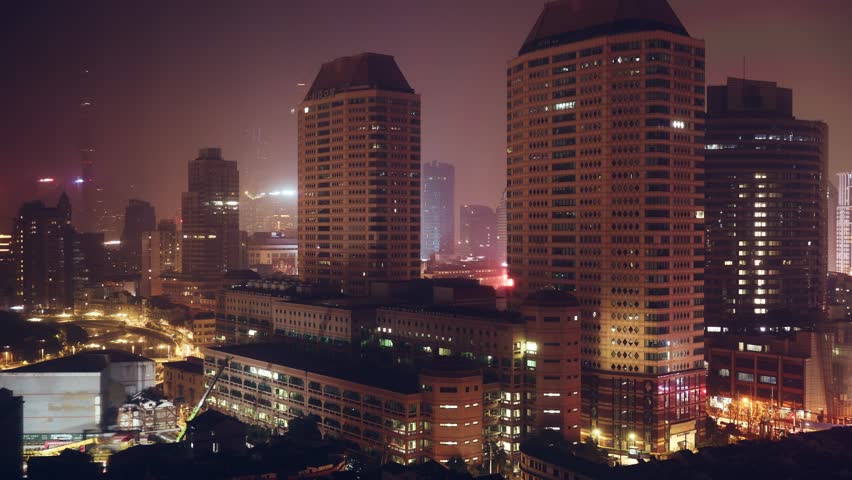Shanghai, China. Nightlife City Traffic Time Lapse. Time-lapse Urban Skyline In Night Time Illumination. City Business Center. Smog Over City. Bright Blue Night Sky. Modern Shanghai