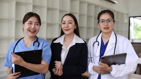 Asian team and face of doctors woman with staff for medical support, insurance and partnership, Healthcare and medical support concept. - Powered by Shutterstock - Get 15% off with code: PIKWIZARD15