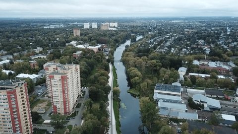 Forward Aerial View over River Neighborhoods