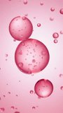 Macro of three drops of red liquid merge into one with bubbles inside. Skin care serum droplets uniting into one. Cosmetics moisturizer fluid concept Vertical video - Powered by Shutterstock - Get 15% off with code: PIKWIZARD15