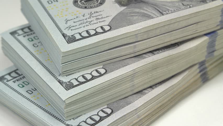 Thirty thousand of american dollars. Cash, finance, savings, wealth. Three packs of one hundred dollars. New hundred dollar bills, USD