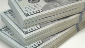 Thirty thousand of american dollars. Cash, finance, savings, wealth. Three packs of one hundred dollars. New hundred dollar bills, USD - Powered by Shutterstock - Get 15% off with code: PIKWIZARD15