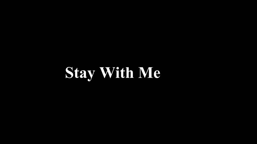 Simple white serif typography displaying the phrase stay with me is centered against a stark black background suggesting a heartfelt plea or lyric for a song or video presentation.