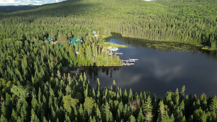 Aerial view of serene lakeside forest, Seigneurie du Triton in Quebec