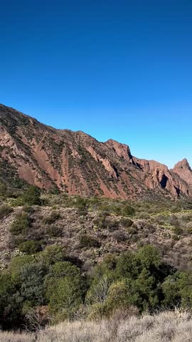 Beautiful Western Texas Landscape with Rolling Hills and Red Mountains (Big Bend National Park, Texas, USA)