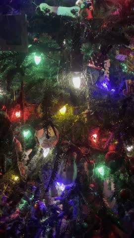 Christmas Lights and Ornaments Twinkling on Decorated Tree Creating Magical Festive Holiday Atmosphere