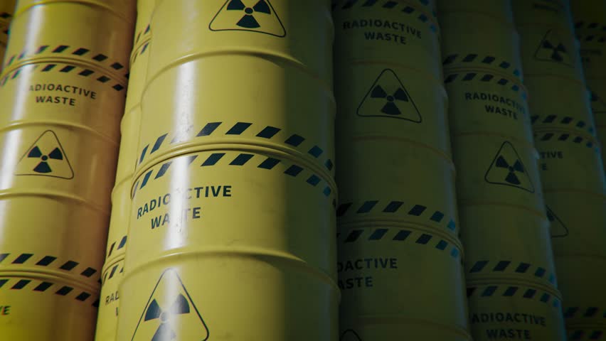 Yellow Radioactive Waste Barrels Stacked in Storage