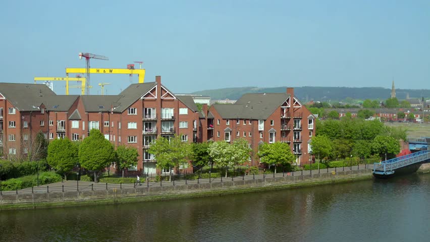 Wide 4K 25FPS video of Samson and Goliath, the Harland and Wolff cranes in Belfast on the Belfast Waterfront, Northern Irealnd on a bright and sunny day. Produced with broadcast ready Rec709 color.