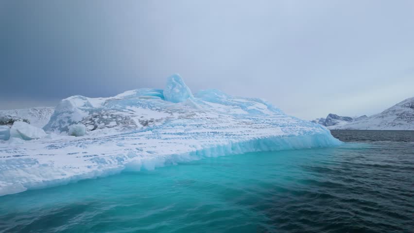 Floating Iceberg Detached From Glacier In Nuuk Fjord In Greenland. POV Shot