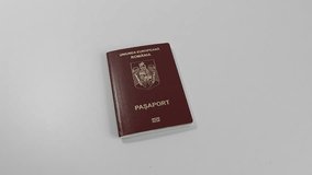 Romanian European Union biometric passport with boarding pass against a white background with Romanian Lei cash money - Powered by Shutterstock - Get 15% off with code: PIKWIZARD15