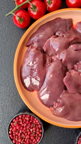 Raw fresh chicken or turkey liver, internal offal of poultry as an ingredient for cooking. Raw chicken liver as a food background