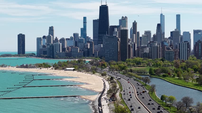 Downtown Chicago Cityscape Skyline, Drone Shot of Central Buildings From Traffic on Lake Shore Drive