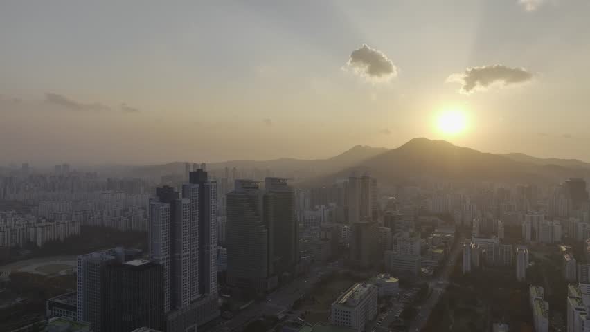 Aerial view over Pyeongchon and Beomgye area at sunset in Anyang City, South Korea