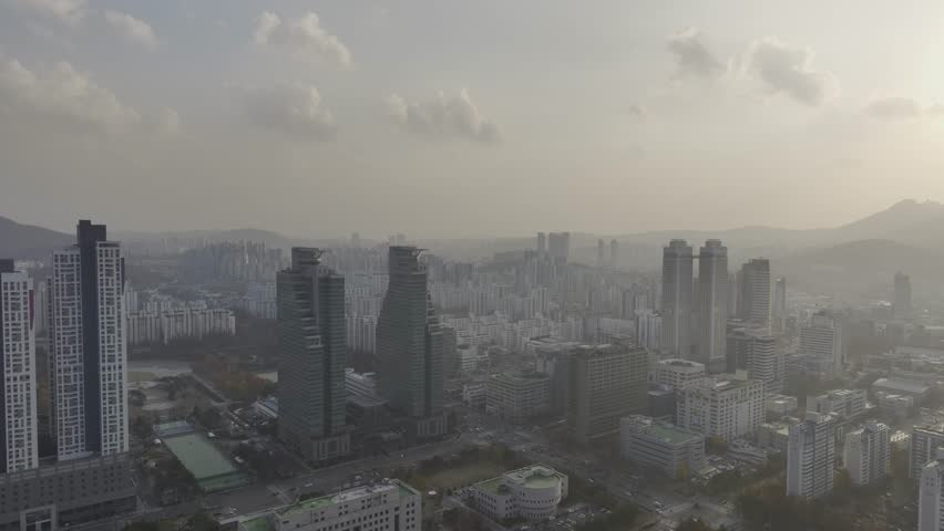 Aerial view over Pyeongchon and Beomgye area at sunset in Anyang City, South Korea