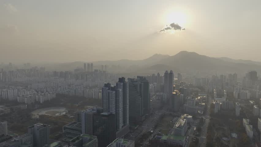Aerial view over Pyeongchon and Beomgye area at sunset in Anyang City, South Korea