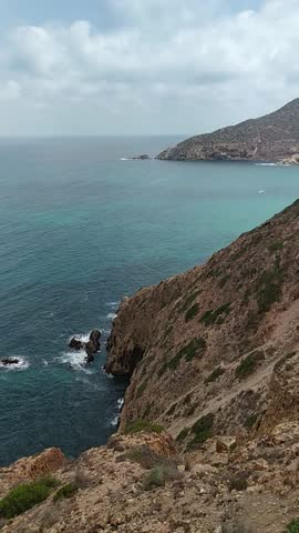 Clear blue sea and beach viewed from the top mountain