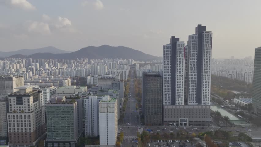 Aerial view over Pyeongchon and Beomgye area at sunset in Anyang City, South Korea