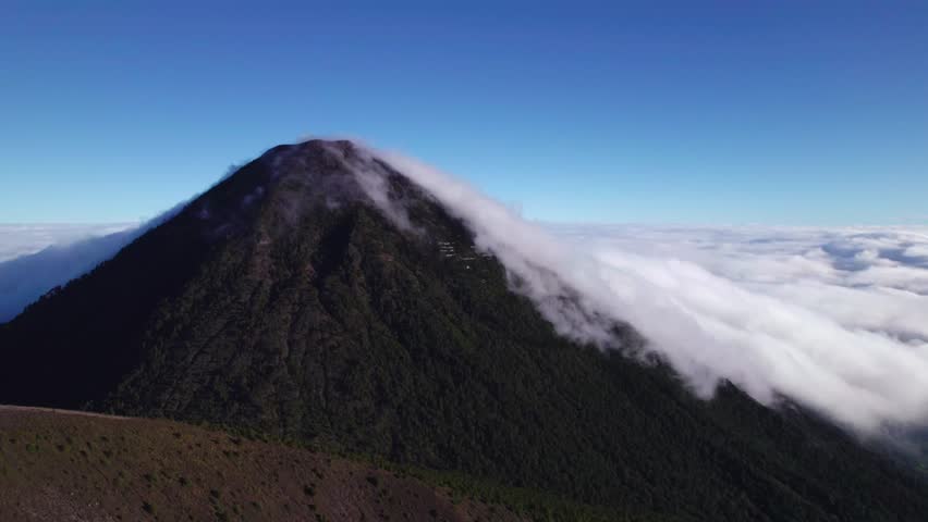 Scenic View Of Clouds Over Acatenango Stratovolcano In Guatemala Near Antigua, Central America. Aerial Shot