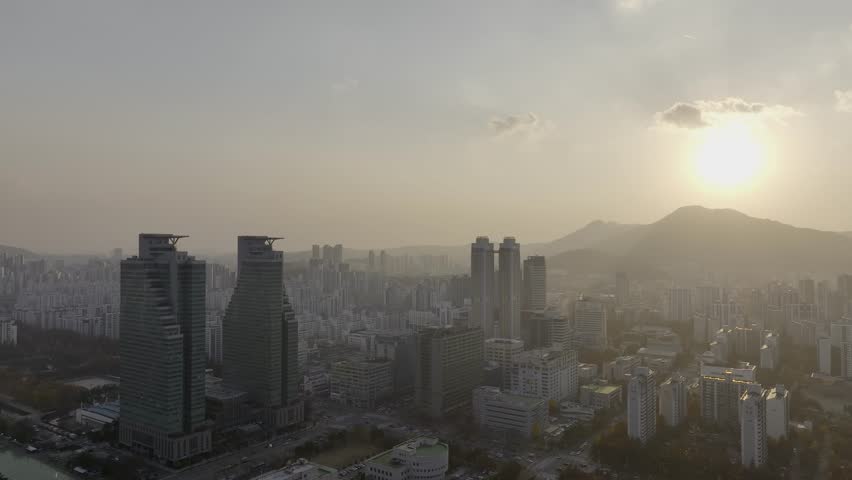 Aerial view over Pyeongchon and Beomgye area at sunset in Anyang City, South Korea