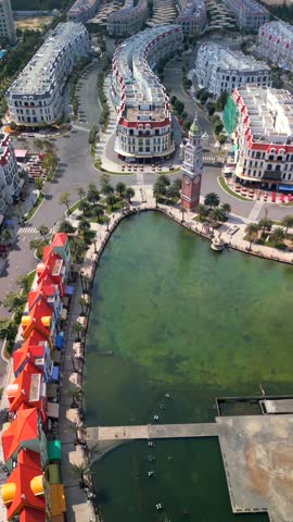 Aerial view of Grand World on Phu Quoc Island, Vietnam. Sunny day, colorful buildings, urban resort landscape, and popular travel destination.