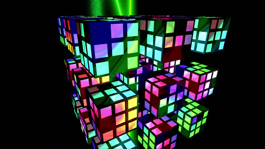 Abstract 3D animation of glowing colorful geometric cubes rotating and exploding in dark space.