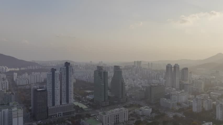 Aerial view over Pyeongchon and Beomgye area at sunset in Anyang City, South Korea