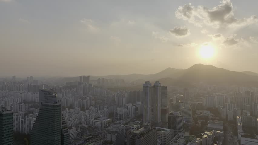 Aerial view over Pyeongchon and Beomgye area at sunset in Anyang City, South Korea
