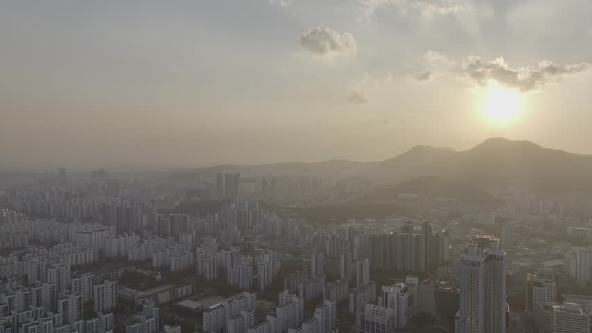 Aerial view over Pyeongchon and Beomgye area at sunset in Anyang City, South Korea