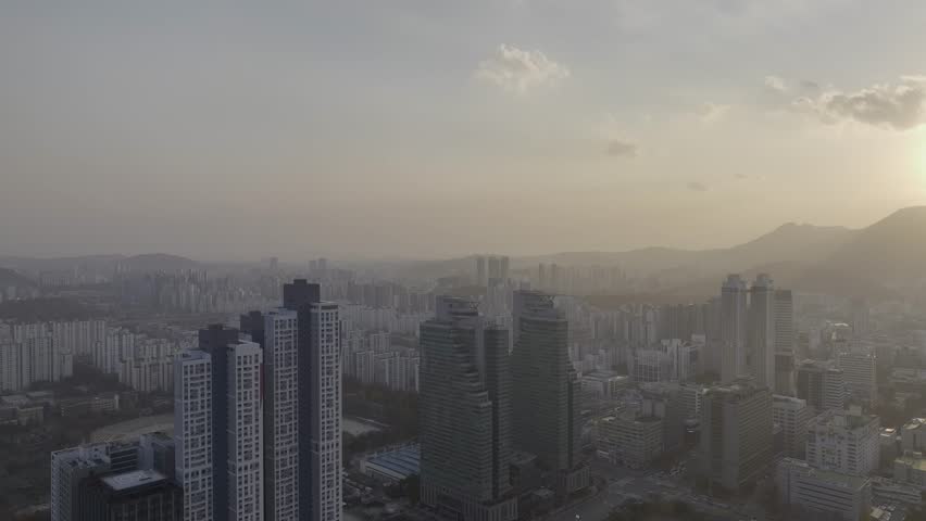 Aerial view over Pyeongchon and Beomgye area at sunset in Anyang City, South Korea
