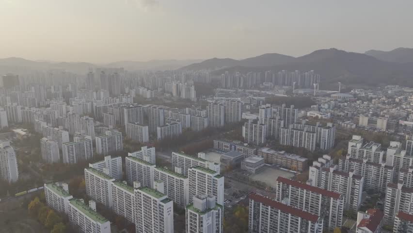 Aerial view over Pyeongchon and Beomgye area at sunset in Anyang City, South Korea