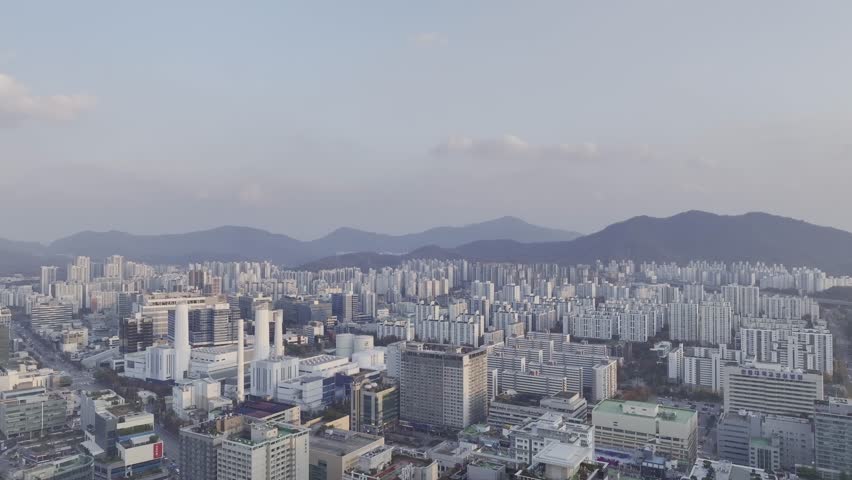 Aerial view over Pyeongchon and Beomgye area at sunset in Anyang City, South Korea