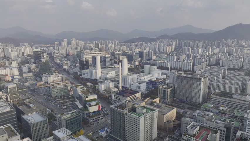 Aerial view over Pyeongchon and Beomgye area at sunset in Anyang City, South Korea