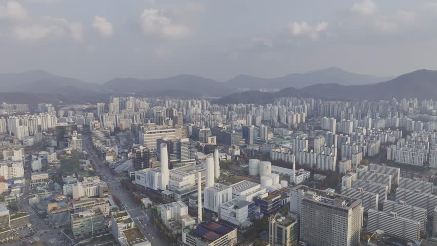Aerial view over Pyeongchon and Beomgye area at sunset in Anyang City, South Korea