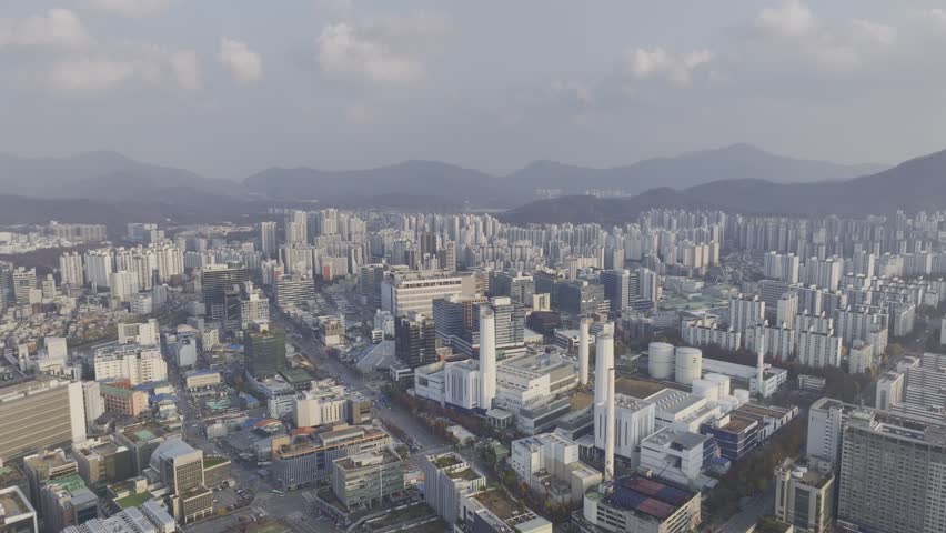 Aerial view over Pyeongchon and Beomgye area at sunset in Anyang City, South Korea