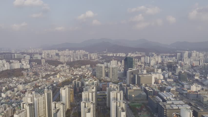 Aerial view over Pyeongchon and Beomgye area at sunset in Anyang City, South Korea