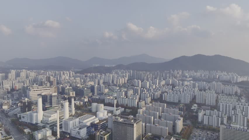 Aerial view over Pyeongchon and Beomgye area at sunset in Anyang City, South Korea