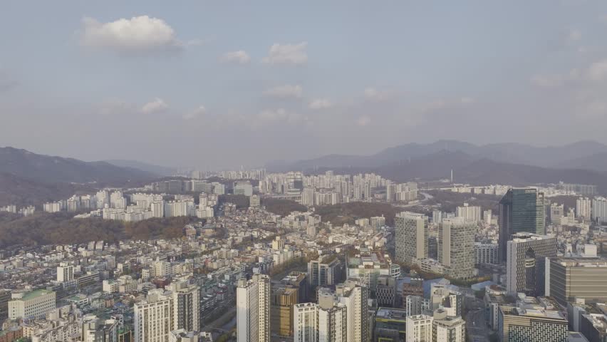 Aerial view over Pyeongchon and Beomgye area at sunset in Anyang City, South Korea