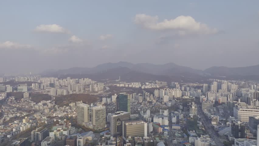 Aerial view over Pyeongchon and Beomgye area at sunset in Anyang City, South Korea