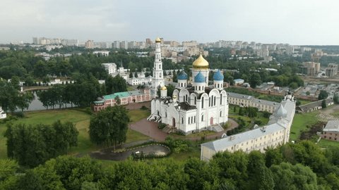 Drone Flying Forward Downward Rotation above Monastery