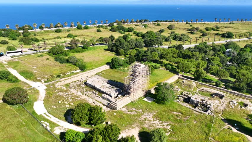 Aerial drone cinematic video of archaeological site of Acropolis, Odeon and Ancient stadium of Rhodes in area of Monte Smith, Rhodes island, Dodecanese, Greece