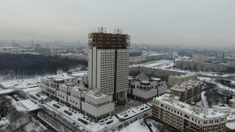 Drone Pulling Back Academy Building Winter