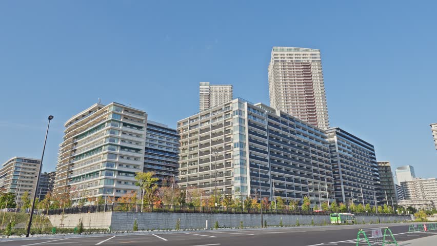 Wide shot of the newly built modern high-rise residential buildings in the Harumi Flag development in Tokyo, Japan.