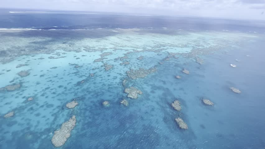 Aerial View of Great Barrier Reef Through Helicopter Window in Australia
