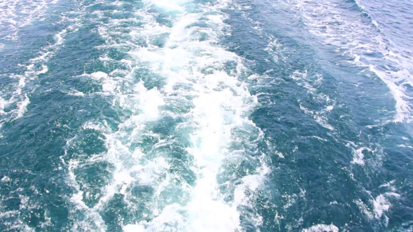 blue sea water passing, view from a moving boat
