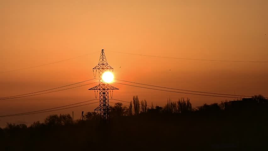 Sunrise over the city in the early morning. Winter fogy landscape time lapse