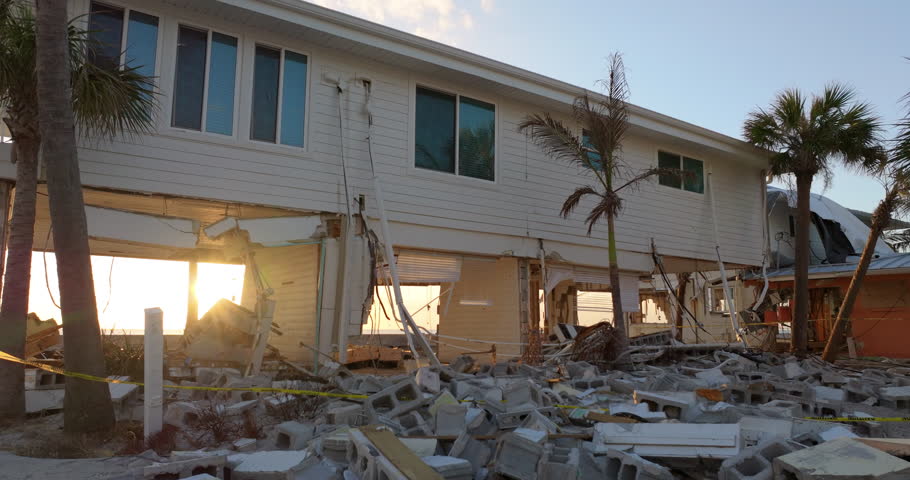 Hurricane Milton storm surge severe damage to waterfront house on Manasota Key, Florida. Destroyed home on gulf coast.