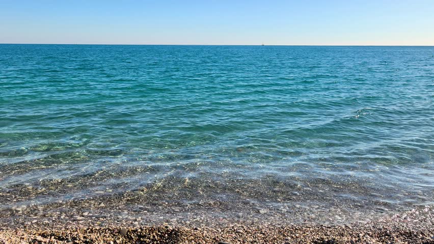 Relaxing Seashore Landscape Under Open Sky. Coastal Scenery with Sea and Horizon Video. Peaceful Seaside Landscape with Calm Ocean View.