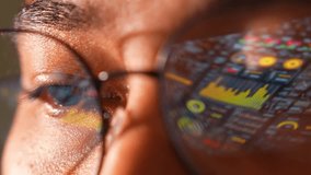 A person in glasses uses a laptop, a real-time data interface reflected signifying analytics, innovation, focus, digital transformation, decision-making, problem-solving, and agility.
 - Powered by Shutterstock - Get 15% off with code: PIKWIZARD15