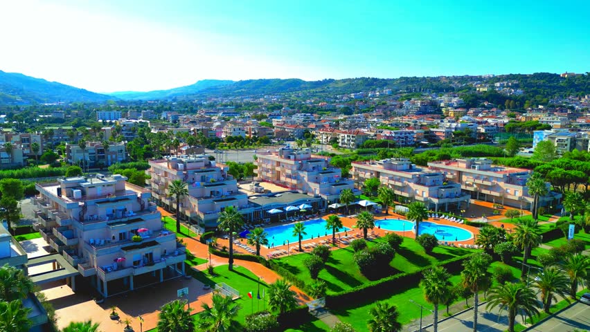 Gorgeous aerial pullback pedestal up shot from Grottammare (AP) with Lungomare Alcide de Gasperi